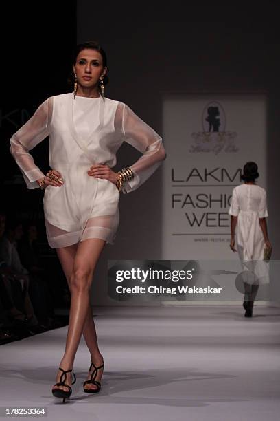 Model showcases designs by House Of Chic by Jinali Sutariya and Heena Surani during day 5 of Lakme Fashion Week Winter/Festive 2013 at the Hotel...