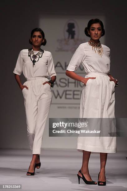 Model showcases designs by House Of Chic by Jinali Sutariya and Heena Surani during day 5 of Lakme Fashion Week Winter/Festive 2013 at the Hotel...