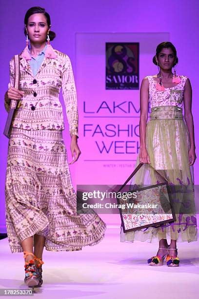 Model showcases designs by Pragya & Megha Samor during day 5 of Lakme Fashion Week Winter/Festive 2013 at the Hotel Grand Hyatt on August 27, 2013 in...