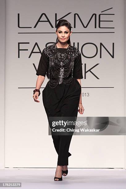Puja Gupta showcases designs by House Of Chic by Jinali Sutariya and Heena Surani during day 5 of Lakme Fashion Week Winter/Festive 2013 at the Hotel...