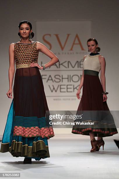 Model showcases designs by SVA during day 5 of Lakme Fashion Week Winter/Festive 2013 at the Hotel Grand Hyatt on August 27, 2013 in Mumbai, India.