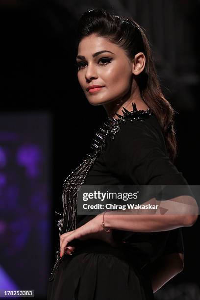 Puja Gupta showcases designs by House Of Chic by Jinali Sutariya and Heena Surani during day 5 of Lakme Fashion Week Winter/Festive 2013 at the Hotel...