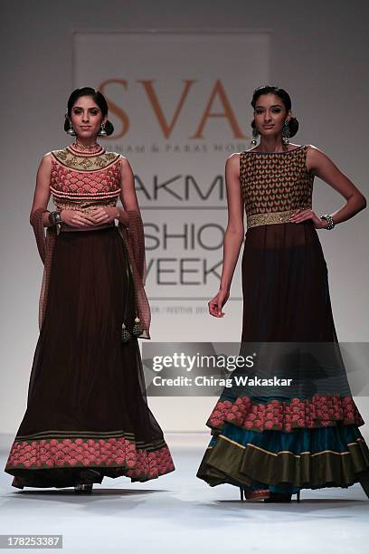 Model showcases designs by SVA during day 5 of Lakme Fashion Week Winter/Festive 2013 at the Hotel Grand Hyatt on August 27, 2013 in Mumbai, India.