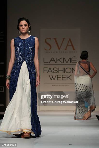 Model showcases designs by SVA during day 5 of Lakme Fashion Week Winter/Festive 2013 at the Hotel Grand Hyatt on August 27, 2013 in Mumbai, India.