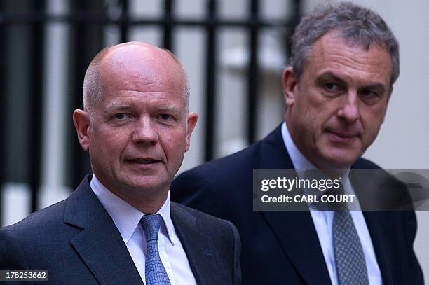 Britain's Foreign Secretary William Hague arrives in Downing Street ahead of a meeting of the National Security Council in central London on August...