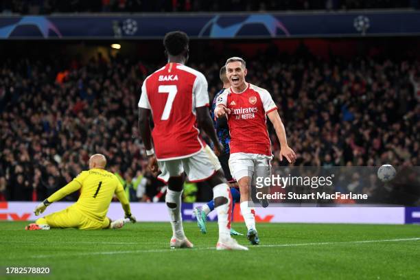 Leandro Trossard of Arsenal celebrates after scoring the team's first goal during the UEFA Champions League match between Arsenal FC and Sevilla FC...