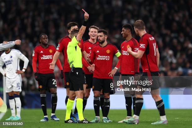 Marcus Rashford of Manchester United is shown a red card by referee Donatas Rumsas during the UEFA Champions League match between F.C. Copenhagen and...