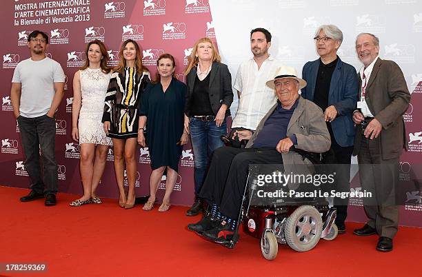 Jury members Jiang Wen, Martina Gedeck, Virginie Ledoyen, Carrie Fisher, Andrea Arnold, Pablo Larrain,the jury President Bernardo Bertolucci, Ryuichi...