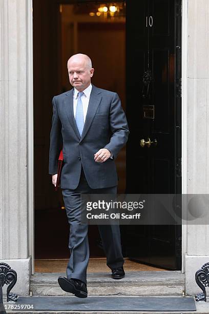 British Foreign Secretary William Hague leaves Number 10 Downing Street on August 28, 2013 in London, England. Prime Minister David Cameron is due to...