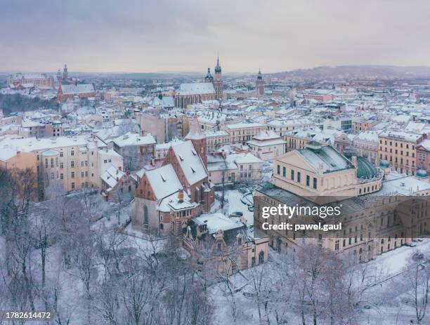 aerial view of krakow city  covered in snow poland - krakow poland stock pictures, royalty-free photos & images