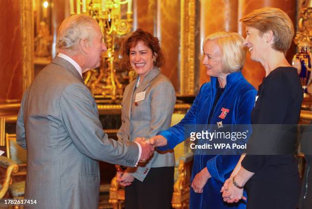 Britain's King Charles III greets Britain's newly appointed Health Secretary Victoria Atkins , Chief Nursing Officer for England Ruth May and Chief...