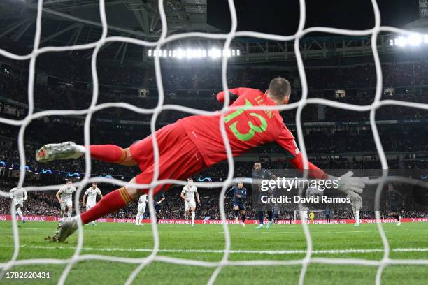 Alvaro Djalo of SC Braga has a penalty kick saved by Andriy Lunin of Real Madrid during the UEFA Champions League match between Real Madrid and SC...