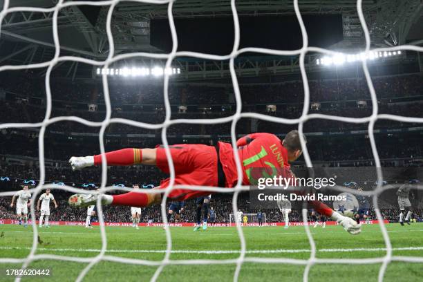 Alvaro Djalo of SC Braga has a penalty kick saved by Andriy Lunin of Real Madrid during the UEFA Champions League match between Real Madrid and SC...