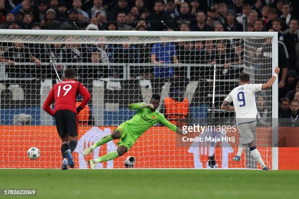 Diogo Goncalves of FC Copenhagen scores the team's second goal from the penalty spot during the UEFA Champions League match between F.C. Copenhagen...