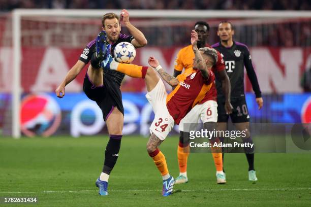 Harry Kane of Bayern Munich battles for possession with Lucas Torreira of Galatasaray during the UEFA Champions League match between FC Bayern...
