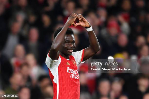 Bukayo Saka of Arsenal celebrates after scoring the team's second goal during the UEFA Champions League match between Arsenal FC and Sevilla FC at...