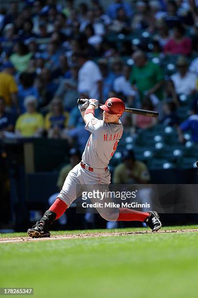 Jack Hannahan of the Cinncinati Reds makes some contact at the plate during the game against the Milwaukee Brewers at Miller Park on August 18, 2013...