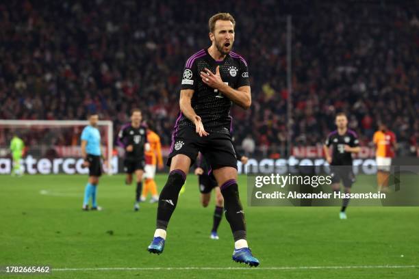 Harry Kane of Bayern Munich celebrates after scoring the team's first goal during the UEFA Champions League match between FC Bayern München and...