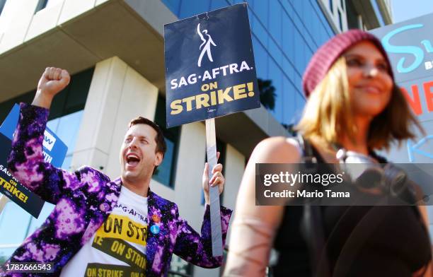 Members and supporters picket outside Netflix studios on day 118 of their strike against the Hollywood studios on November 8, 2023 in Los Angeles,...