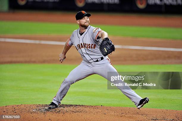 Pitcher Chad Gaudin of the San Francisco Giants pitches during an MLB game against the Miami Marlins at Marlins Park on August 16, 2013 in Miami,...