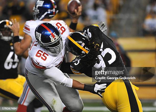 Offensive lineman Will Beatty of the New York Giants blocks linebacker Jarvis Jones of the Pittsburgh Steelers during a preseason game at Heinz Field...