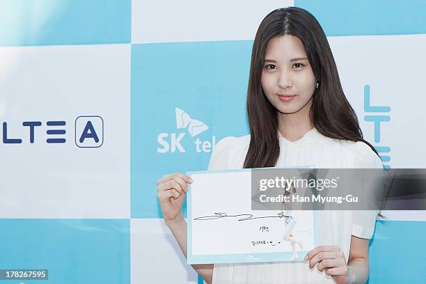 Seohyun of South Korean girl group Girls' Generation attends during the autograph session for SK Telecom on August 28, 2013 in Seoul, South Korea.