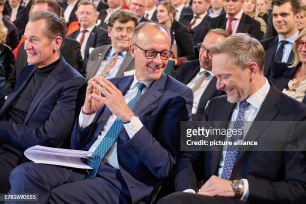 November 2023, Berlin: Mathias Döpfner , CEO of Axel Springer, Friedrich Merz, Federal Chairman of the CDU, and Christian Lindner , Federal Minister...