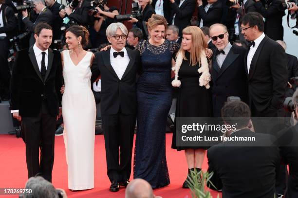 Jury members Pablo Larrain, Virginie Ledoyen, Ryuichi Sakamoto, Martina Gedek, Andrea Arnold, Renato Berta, Jiang Wen attend 'Gravity' premiere and...