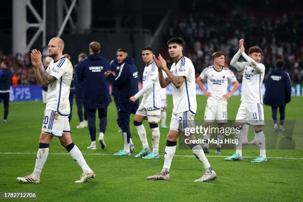 Nicolai Boilesen and Kevin Diks of FC Copenhagen acknowledges the fans following the UEFA Champions League match between F.C. Copenhagen and...