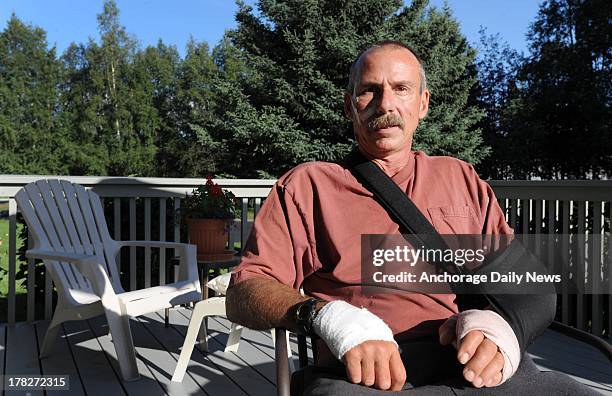 Hunting guide Jim Tuttle, pictured August 25 was mauled by female Arctic grizzly bear known as Buddy, while he was walking alone between his campsite...