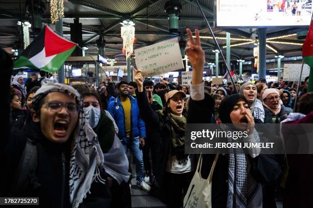 People rally to show solidarity with Gaza at Schiphol on November 14, 2023 as fighting raged in Gaza more than five weeks after Hamas's shock attack...