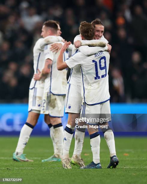 Rasmus Falk and Elias Jelert of FC Copenhagen embrace after the team's victory during the UEFA Champions League match between F.C. Copenhagen and...