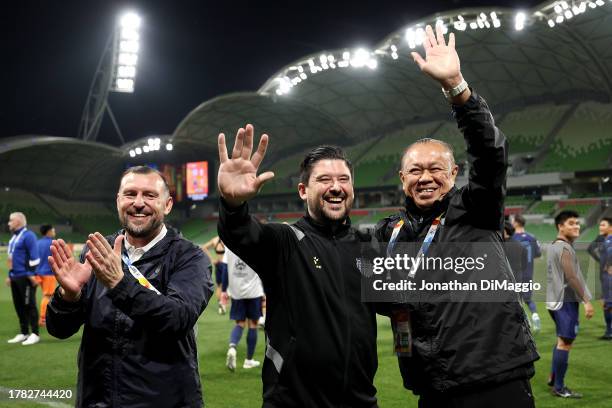 Buriram United Head Coach Athanasios Papastamatiou and team officials are seen celebrating the win with fans during the AFC Champions League Group H...