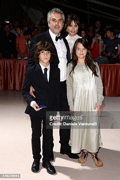 Sheherazade Goldsmith and director Alfonso Cuaron attend the Opening Ceremony during The 70th Venice International Film Festival on August 28, 2013...