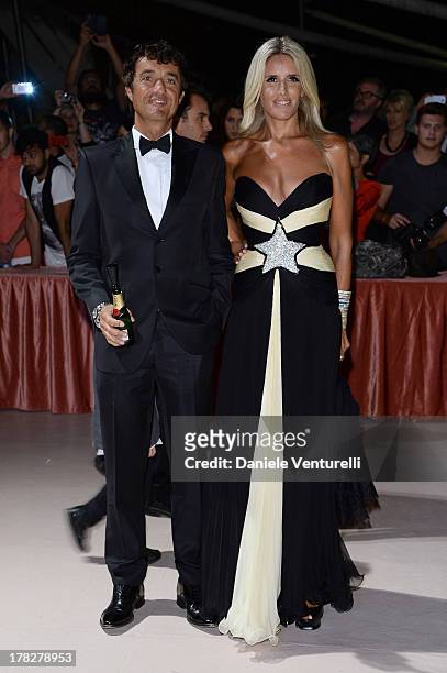 Giulio Base and Tiziana Rocca attend the Opening Ceremony during The 70th Venice International Film Festival on August 28, 2013 in Venice, Italy.