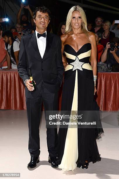 Giulio Base and Tiziana Rocca attend the Opening Ceremony during The 70th Venice International Film Festival on August 28, 2013 in Venice, Italy.