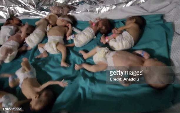 Screen grab captured from a video shows premature babies under treatment in the neonatal intensive care unit remove from the incubators and...