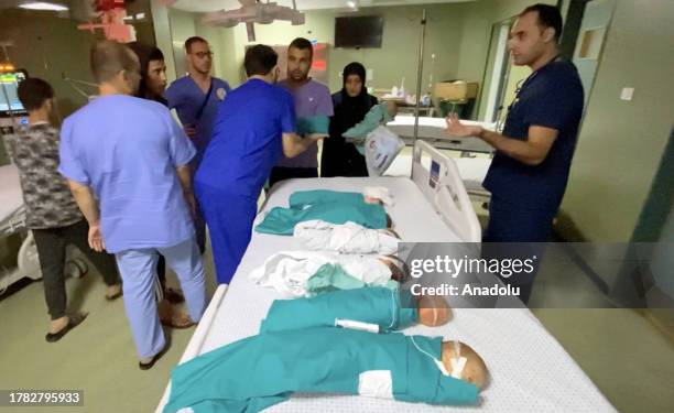 Screen grab captured from a video shows premature babies under treatment in the neonatal intensive care unit remove from the incubators and...