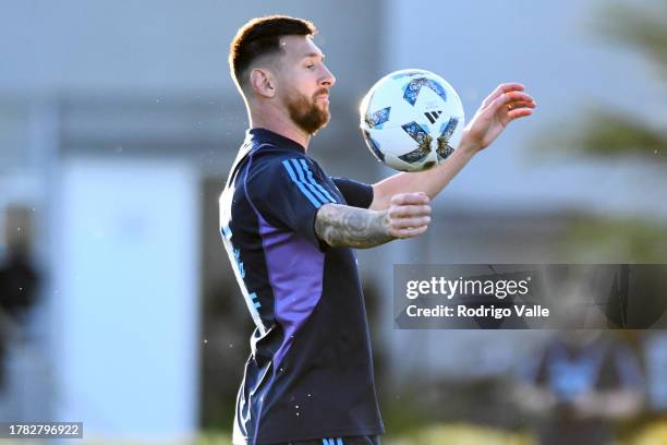 Lionel Messi of Argentina controls the ball during a training session of Argentina national team at Lionel Messi Training Camp on November 14, 2023...