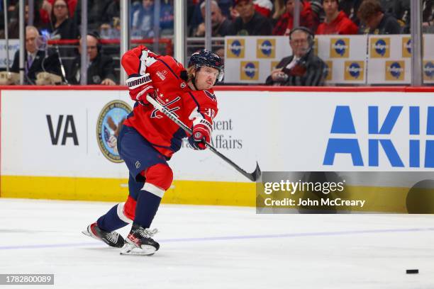 Rasmus Sandin of the Washington Capitals takes a shot on goal during a game against the Vegas Golden Knights at Capital One Arena on November 14,...