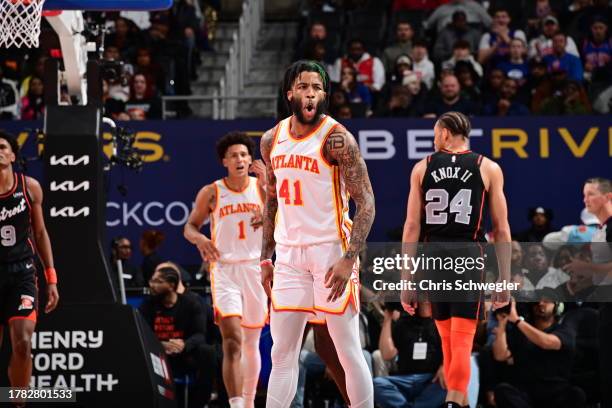 Saddiq Bey of the Atlanta Hawks celebrates a three point basket during the game against the Detroit Pistons during the In-Season Tournament on...