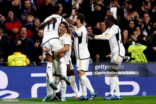 Rodrygo Goes player of Real Madrid celebrate his goal with teammates during the UEFA Champions League match between Real Madrid and SC Braga at...