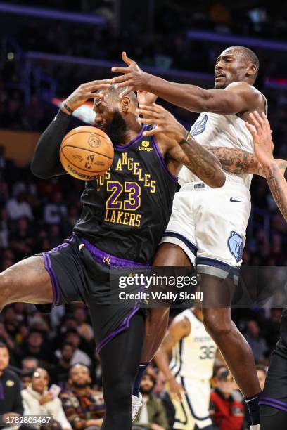 Los Angeles, CA Los Angeles Lakers' LeBron James has the ball blocked by Memphis Grizzlies' Bismack Biyombo during the first quarter at Crypto.com...