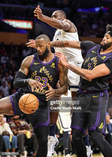 Los Angeles, CA Los Angeles Lakers' LeBron has the ball blocked by Memphis Grizzlies' Bismack Biyombo during the first quarter at the Crypto.com...