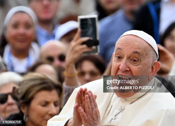 Pope Francis attends his weekly general audience in Saint Peter's square in The Vatican on November 15, 2023.