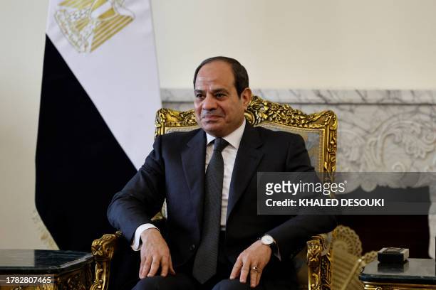 Egyptian President Abdel Fattah al-Sisi gestures during a meeting with the French armies minister at the Ittihadia presidential Palace in Cairo on...
