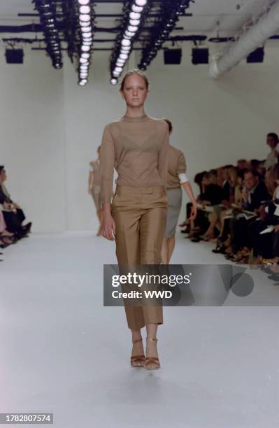 This is the first collection designed by Francisco Costa following Calvin Klein's departure from his eponymous label in the fall of 2003. Model Bruna...