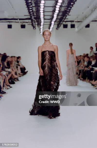 This is the first collection designed by Francisco Costa following Calvin Klein's departure from his eponymous label in the fall of 2003. Model...