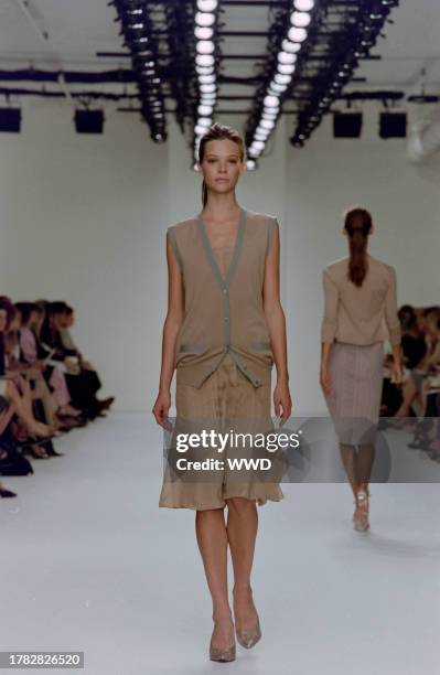 This is the first collection designed by Francisco Costa following Calvin Klein's departure from his eponymous label in the fall of 2003. Model Susan...