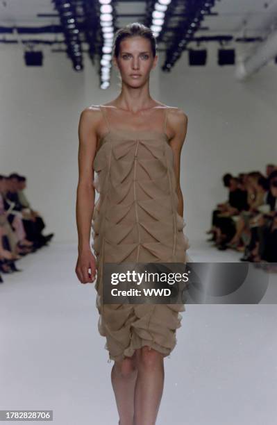 This is the first collection designed by Francisco Costa following Calvin Klein's departure from his eponymous label in the fall of 2003. Model Diana...